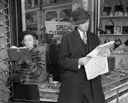 The two main leads from Shop around the Corner reading a book and newspaper respectively